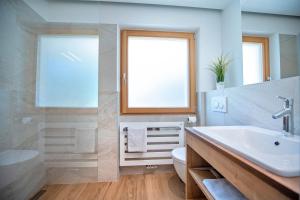 Kúpeľňa v ubytovaní Apartments Cesa Ploner