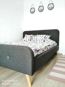 Ένα ή περισσότερα κρεβάτια σε δωμάτιο στο Cozy Apartment Narciselor Suceava
