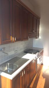 A kitchen or kitchenette at ATTICO GIGI