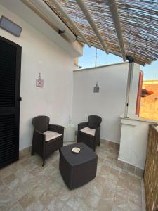 A balcony or terrace at Elly’s House