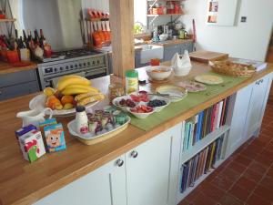 a kitchen counter with fruits and vegetables on it at Sans, Souci. @ Mill House in Horncastle