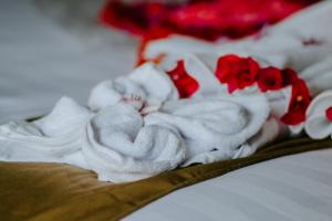 Kurnia Guest House & Spa客房内的一张或多张床位