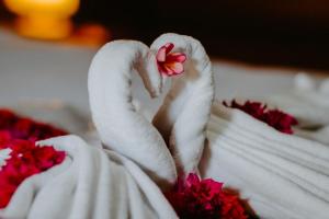 Kurnia Guest House & Spa客房内的一张或多张床位