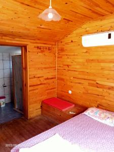 A bed or beds in a room at Olympos Woods