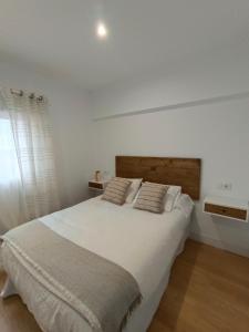 Posteľ alebo postele v izbe v ubytovaní Hotel Posada del Mar