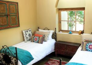 
A bed or beds in a room at Akasha Mountain Retreat
