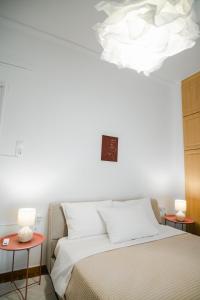 Postel nebo postele na pokoji v ubytování Flat 126 + 44 fotografií