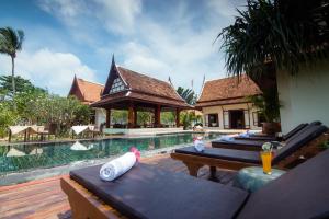 The swimming pool at or near Baan Thai Lanta Resort