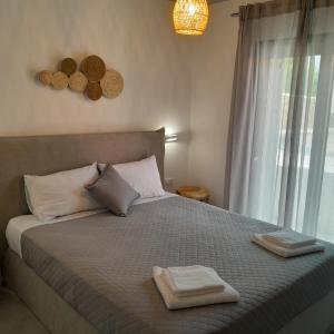 Kama o mga kama sa kuwarto sa Brand new flat near de bosset bridge, Argostoli
