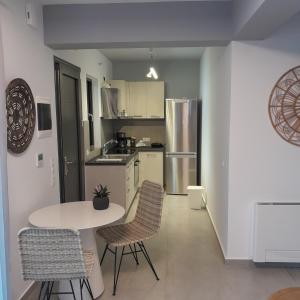 Kuchyň nebo kuchyňský kout v ubytování Brand new flat near de bosset bridge, Argostoli