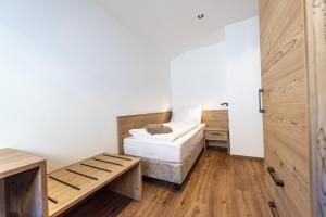 Posteľ alebo postele v izbe v ubytovaní Luech da Perteut - Panorama and Wellness