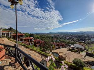 a view of a city with houses on a hill at Hotel Las Rocas Resort Villanueva in Villanueva