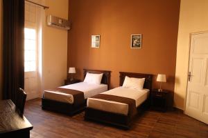 Krevet ili kreveti u jedinici u okviru objekta Gresham Hotel