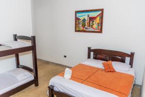 Postel nebo postele na pokoji v ubytování Agradable cabaña cafetera con jacuzzi a 12 min del centro de pereira