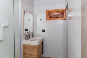 Koupelna v ubytování Agradable cabaña cafetera con jacuzzi a 12 min del centro de pereira
