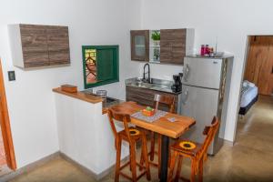Kuchyň nebo kuchyňský kout v ubytování Agradable cabaña cafetera con jacuzzi a 12 min del centro de pereira
