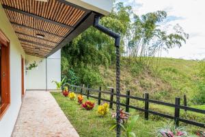 Zahrada ubytování Agradable cabaña cafetera con jacuzzi a 12 min del centro de pereira