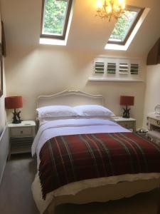 A bed or beds in a room at The Stable Loft...a cosy self contained apartment