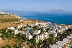 an aerial view of a resort next to the ocean at Europa Beach Hotel & Spa in Hersonissos