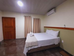 Katil atau katil-katil dalam bilik di Cabaña Rural Pura Vida