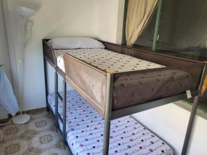 Łóżko lub łóżka w pokoju w obiekcie Delta del sur