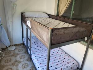 Łóżko lub łóżka w pokoju w obiekcie Delta del sur