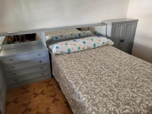 Łóżko lub łóżka w pokoju w obiekcie Delta del sur