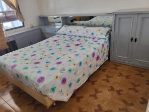 Łóżko lub łóżka w pokoju w obiekcie Delta del sur