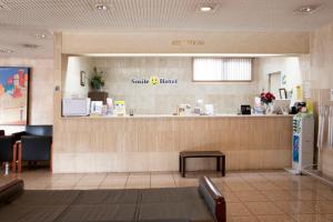 a waiting area of a sun smile food restaurant at Smile Hotel Sugamo in Tokyo