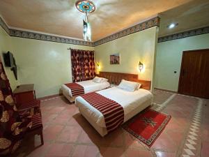 Hotel Kasbah Lamrani客房内的一张或多张床位