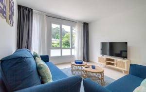 Telewizja i/lub zestaw kina domowego w obiekcie Duerming Park Viveiro