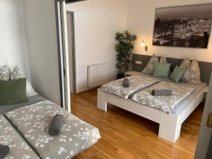 Postel nebo postele na pokoji v ubytování Apartsee Zell am See