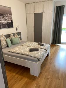 Postel nebo postele na pokoji v ubytování Apartsee Zell am See