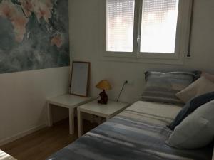 Postel nebo postele na pokoji v ubytování El Cau de Ribes