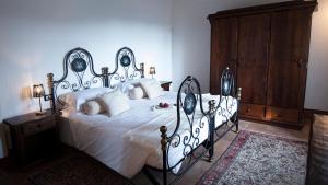 Posteľ alebo postele v izbe v ubytovaní I Salici Agriturismo