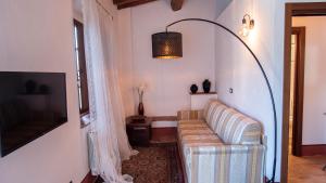 Televízia a/alebo spoločenská miestnosť v ubytovaní I Salici Agriturismo