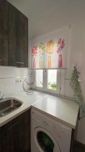 Kuchyňa alebo kuchynka v ubytovaní Hope's ático-apartamento