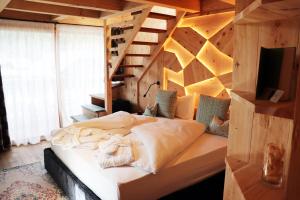 Postel nebo postele na pokoji v ubytování Alpine Residence Villa Adler