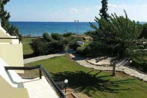 a view of the ocean from the balcony of a house at Villa Splash in Boghaz