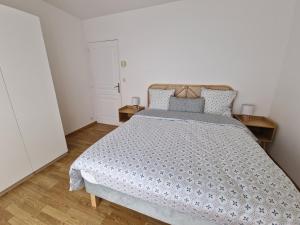 Postel nebo postele na pokoji v ubytování Gîte de Kerninon Maison spacieuse et lumineuse