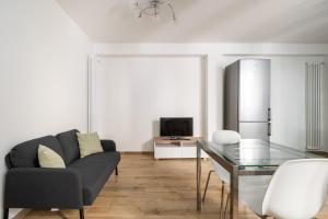 A television and/or entertainment centre at Bologna Suite Centre City