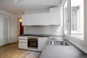 A kitchen or kitchenette at Bologna Suite Centre City