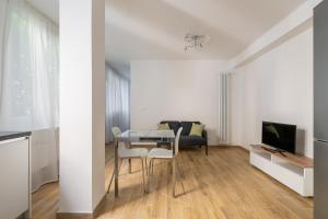 A television and/or entertainment centre at Bologna Suite Centre City