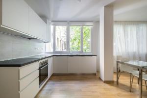 A kitchen or kitchenette at Bologna Suite Centre City