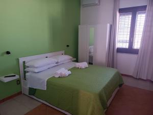 Postel nebo postele na pokoji v ubytování Ilary's Rooms