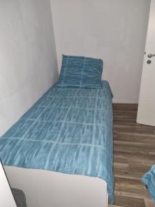 Postel nebo postele na pokoji v ubytování Maria Apartment