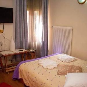 Ein Bett oder Betten in einem Zimmer der Unterkunft Cabana Ancuța