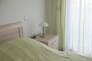 Postel nebo postele na pokoji v ubytování Villa Danex Premium