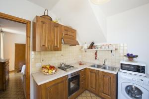Een keuken of kitchenette bij Gabbiano