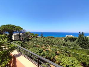 a view of the ocean from the balcony of a house at Sanmarcomare in Sciacca